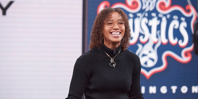 Natasha Cloud of the Washington Mystics smiles during the 2022 WNBA Draft Lottery on December 19, 2021, at ESPN in Bristol, Connecticut.