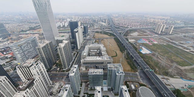 An aerial view shows the construction site of the new campus of New York University, NYU Shanghai, in Shanghai, China, Feb. 16, 2022.