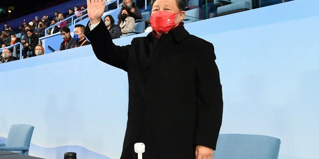 Chinese President Xi Jinping waves during the closing ceremony of the Beijing 2022 Paralympic Winter Games at the National Stadium in Beijing, capital of China, March 13, 2022. (Photo by Xie Huanchi/Xinhua via Getty Images)