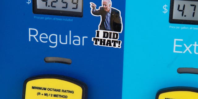 A gas pump with a sticker of President Biden, at a gas station in Arlington, Virginia, on March 16, 2022.