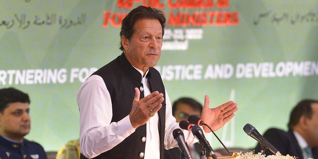 Pakistani Prime Minister Imran Khan speaks during the 48th session of the Organization of Islamic Cooperation Council of Foreign Ministers, in Islamabad on March 22, 2022.