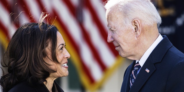 President Biden speaks with Vice President Kamala Harris after signing H.R. 55, the "Emmett Till Antilynching Act," during a ceremony in the Rose Garden of the White House March 29, 2022.