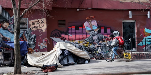 A homeless encampment is seen at East 13th Street between Avenue A and First Avenue in downtown Manhattan Wednesday morning. New York City.