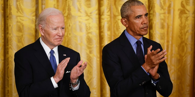 President Joe Biden and former President Barack Obama attend an event to mark the 2010 passage of the Affordable Care Act in the East Room of the White House on April 5, 2022, in Washington, D.C.