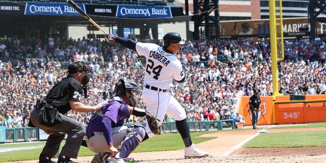 Detroit Tigers designated hitter Miguel Cabrera (24) hits a single for his 3,000th career hit during the first inning of a game between the Colorado Rockies and Tigers April 23, 2022, at Comerica Park in Detroit.