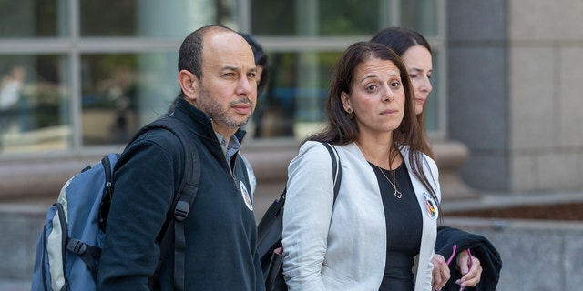 Nancy Iskander and her husband Karim leave Van Nuys Courthouse during a lunch break from a preliminary hearing for Rebecca Grossman, who is charged with murder and other counts stemming from a crash in Westlake Village that left the Iskanders sons Mark Iskander, 11, and Jacob Iskander, 8, dead.