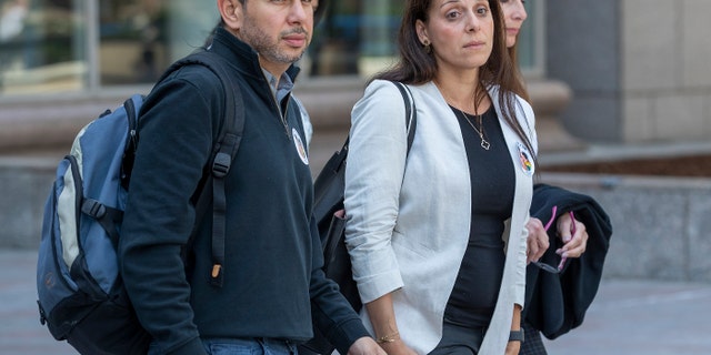 Nancy Iskander and her husband Karim leave Van Nuys Courthouse during a lunch break from a preliminary hearing for Rebecca Grossman who is charged with murder and other counts stemming from a crash in Westlake Village that left the Iskanders sons Mark Iskander, 11, and Jacob Iskander, 8, dead. 