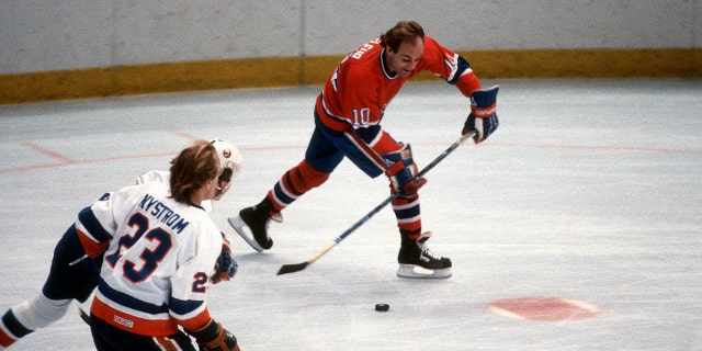Guy Lafleur #10 of the Montreal Canadiens skates against the New York Islanders during an NHL Hockey game circa 1984 at the Nassau Veterans Memorial Coliseum in Uniondale, New York. Lafleur playing career went from 1971-85 and 1988-91.