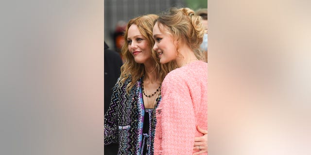 Vanessa Paradis and daughter Lily-Rose Depp attend the Chanel Womenswear Spring/Summer 2021 show as part of Paris Fashion Week Oct. 6, 2020, in Paris.