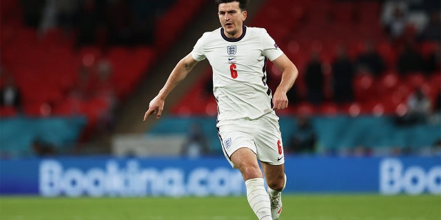 Harry Maguire of England runs with the ball during the UEFA Euro 2020 Championship Group D match between the Czech Republic and England at Wembley Stadium on June 22, 2021, in London, England.