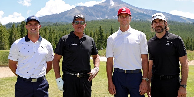 Bryson DeChambeau, Phil Mickelson, Tom Brady, and Aaron Rodgers pose for photos during Capital One's The Match at The Reserve at Moonlight Basin on July 6, 2021 in Big Sky, Montana.