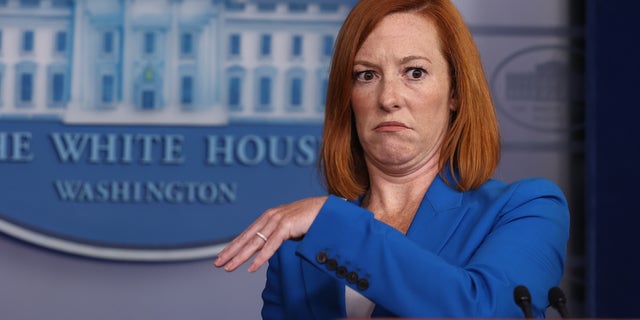 WASHINGTON, DC - AUGUST 30: White House Press Secretary Jen Pskai swats at an insect flying near her head during the daily news conference in the Brady Press Briefing Room at the White House on August 30, 2021 in Washington, DC. Psaki fielded questions about Hurricane Ida, the ongoing pull out of U.S. military forces and their allies from Afghanistan and other topics. (Photo by Chip Somodevilla/Getty Images)