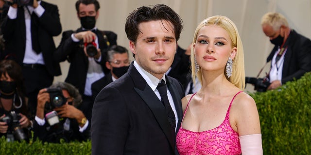 Nicola Peltz Beckham thinks the rumors of a feud started when fans saw her walk down the aisle at her wedding in a Valentino gown rather than a gown designed by Victoria Beckham.
