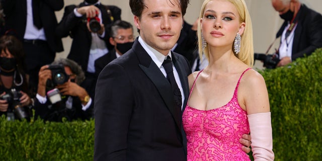 Nicola Peltz Beckham thinks the rumors of a feud started when fans saw her walk down the aisle at her wedding in a Valentino gown rather than a gown designed by Victoria Beckham.