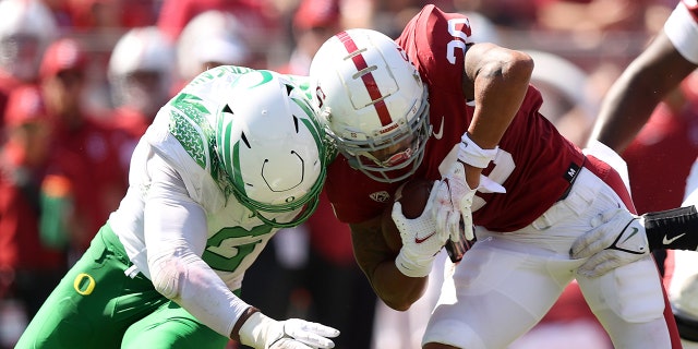 Top NFL prospect Kayvon Thibodeaux calls out critics questioning draft stock: 'That's outrageous' Austin Jones of the Stanford Cardinal is tackled by Kayvon Thibodeaux (5) of the Oregon Ducks at Stanford Stadium Oct. 2, 2021, in Stanford, Calif.