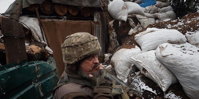 Vitaly, 52, says he is of Russian origin and fought in the Russian army during the first Chechen war but fights alongside Ukrainian soldiers Feb. 9, 2022, in Pisky, Ukraine. 