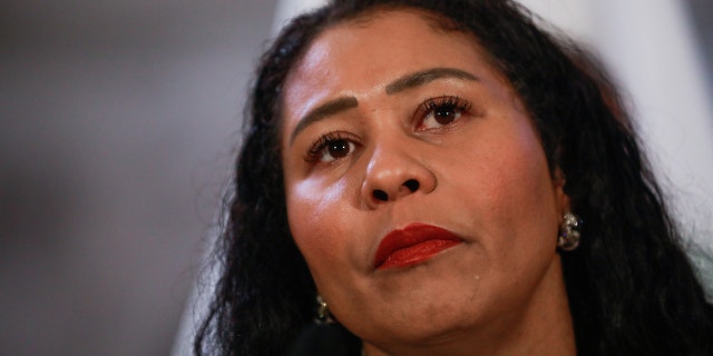 San Francisco Mayor London Breed listens at a press conference at City Hall on Wednesday, Feb. 16, 2022, in San Francisco.