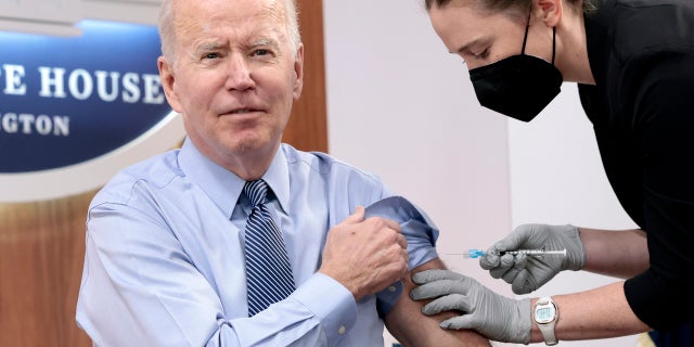President Joe Biden receives a fourth dose of the Pfizer/BioNTech Covid-19 vaccine in the South Court Auditorium on March 30, 2022 in Washington, D.C.