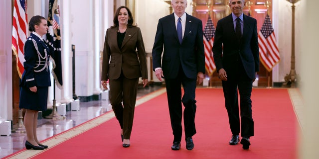 Vice President Kamala Harris, former President Barack Obama, and U.S. President Joe Biden arrive for an event to mark the 2010 passage of the Affordable Care Act in the East Room of the White House on April 5, 2022 in Washington, DC.