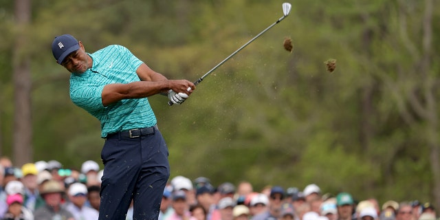 Tiger Woods plays his shot from the 12th tee during the second round of The Masters at Augusta National Golf Club in Augusta, Georgia, on April 8, 2022.