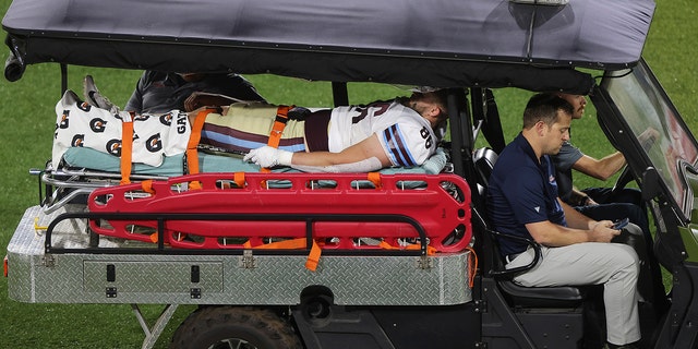 Joey Magnifico #86 of Michigan Panthers is taken off the field with an injury in the second quarter of the game against the New Jersey Generals at Protective Stadium on April 22, 2022 in Birmingham, Alabama. 