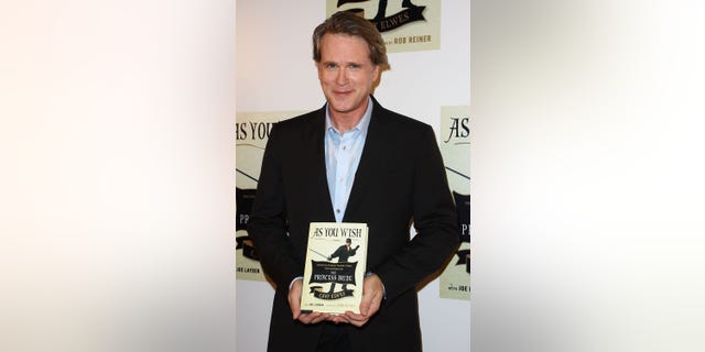 Actor Cary Elwes with his book "As You Wish: Unimaginable Tales of the Creation of the Princess Bride" in October 2014.