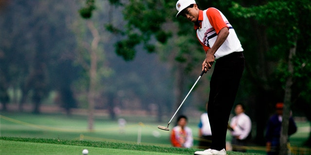 Tiger Woods practices on Griffith Park golf course as a 16-year old in 1991. (Photo by Per-Anders Pettersson/Corbis via Getty Images)