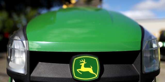 The John Deere logo is displayed on a riding mower at Belkorp Ag on May 20, 2016, in Santa Rosa, Calif. (Photo by Justin Sullivan/Getty Images)