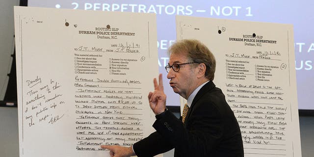 Barry Scheck, co-director of the New York-based Innocence Project, goes over copies of police notes during a hearing for relief in the Darryl Anthony Howard murder case at the Durham County Judicial Center in Durham, North Carolina, on Wednesday, Aug. 31, 2016.