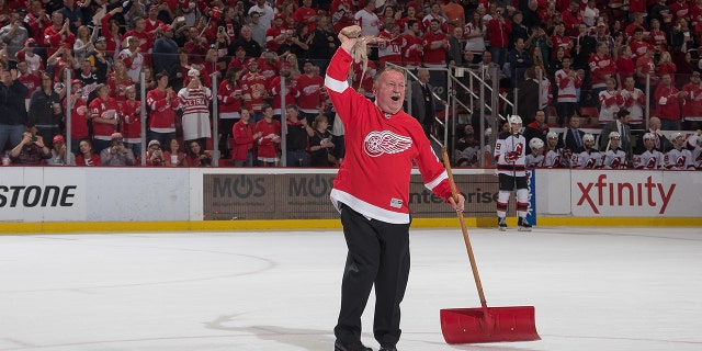 Building Operations Manager and Zamboni driver Al Sobotka twirls an octopus that was thrown on the ice on a stoppage in play during the final home game ever played at Joe Louis Arena on April 9, 2017 in Detroit, Michigan.