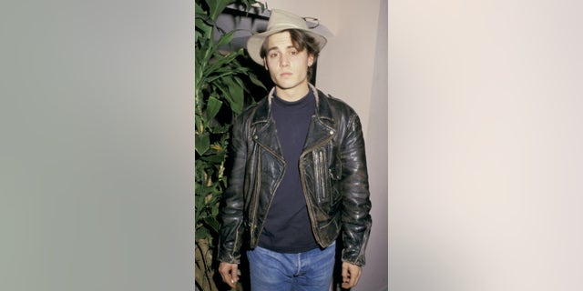 Johnny Depp is pictured here. Prior to being an actor, Depp dropped out of high school and joined a band called, The Kids. As a result, he moved to Los Angeles.