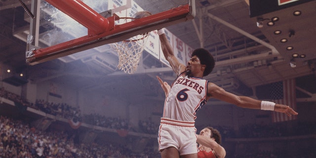 Julius Erving diving against the Portland Trail Blazers in Philadelphia on May 26, 1977.