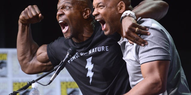 Terry Crews (L) and Will Smith pose onstage at Netflix Films: "Bright" and "Death Note" panel during Comic-Con International 2017 at San Diego Convention Center.