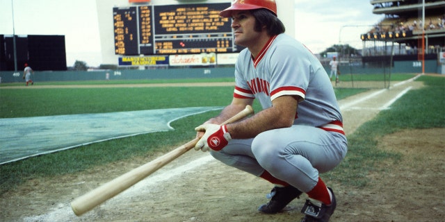 American baseball player Pete Rose, of the Cincinatti Reds, crouches on the field before a game at Shea Stadium in Flushing Meadows-Corona Park, Queens, New York, New York, July 24, 1978. The game, against the New York Mets, resulted in Rose increasing his hitting streak to 37 consecutive games (the streak eventually lasted 44 games).