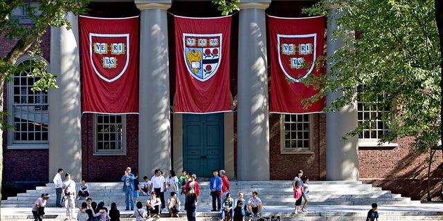 Banners hang outside Memorial Church on the Harvard University campus in Cambridge, Mass., Sept. 4, 2009. 