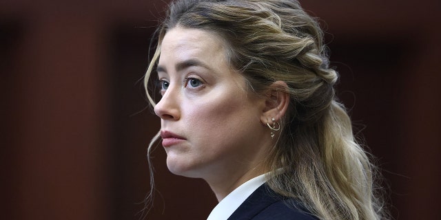 Amber Heard attends the defamation trial against her at the Fairfax County Circuit Courthouse, April 21, 2022.