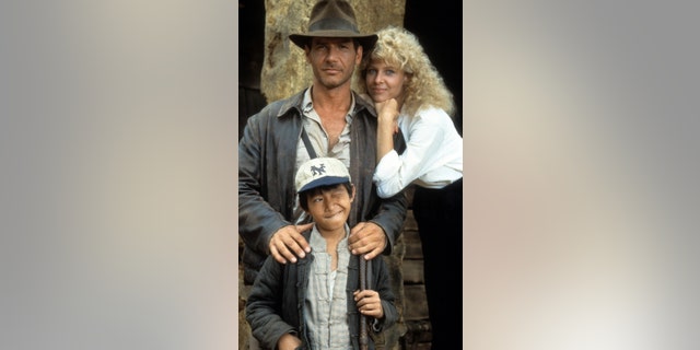 Harrison Ford, Ke Huy Quan and Kate Capshaw on set of the film "Indiana Jones And The Temple Of Doom," 1984.