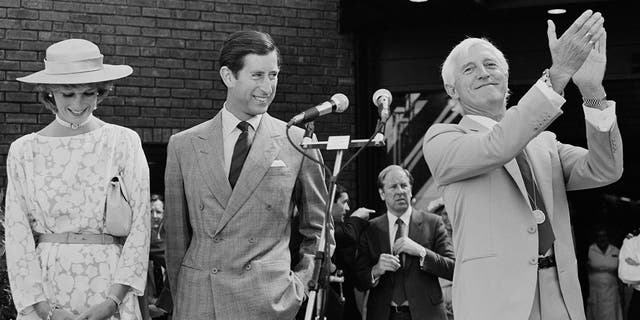 Diana, Princess of Wales, Charles, Prince of Wales, and English DJ, television and radio broadcaster Jimmy Savile at the opening of the National Spinal Injuries Centre at Stoke Mandeville Hospital, U.K., Aug. 4, 1983.