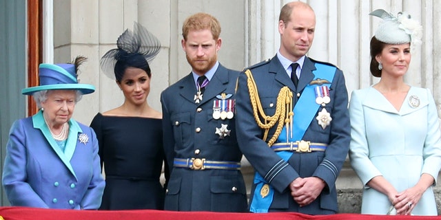 Queen Elizabeth II, Meghan, Prince Harry, Prince William and Catherine, circa 2018.