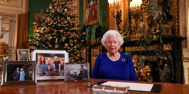 In this undated photo, Queen Elizabeth II records her annual Christmas broadcast in Windsor Castle, Berkshire, England. 