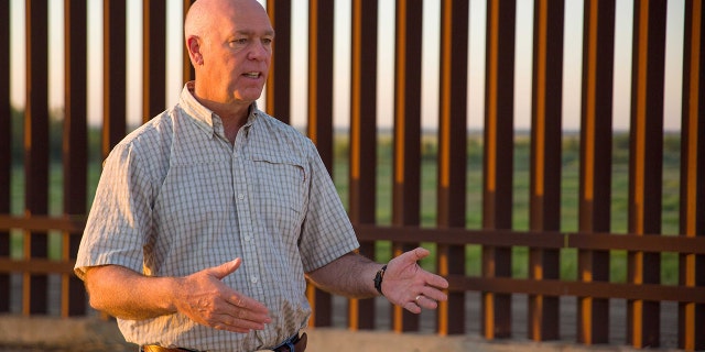 Montana Gov. Greg Gianforte receives a briefing on the crisis at the U.S.-Mexico border in October 2021 during a trip to Mission, Texas.