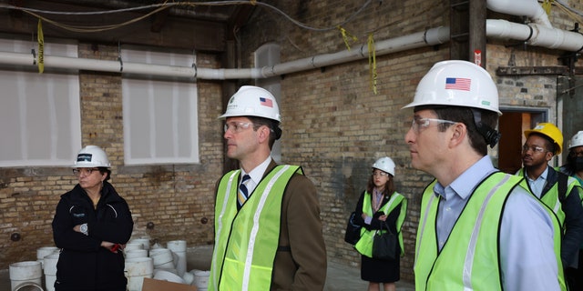 Reps. Jim Himes, left, and Bryan Steil in Wisconsin. 