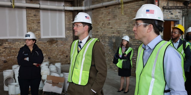 Reps. Jim Himes, left, and Bryan Steil in Wisconsin. 