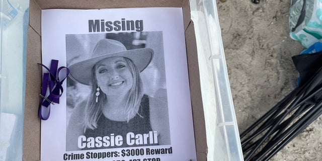 Flyer seen as gathering site for volunteers who were searching for Cassie Carli in Navarre Beach, Florida, April 2, 2022