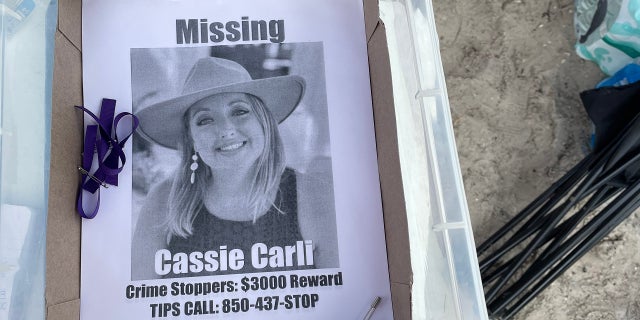 Flyer seen as gathering site for volunteers who were searching for Cassie Carli in Navarre Beach, Florida, April 2, 2022