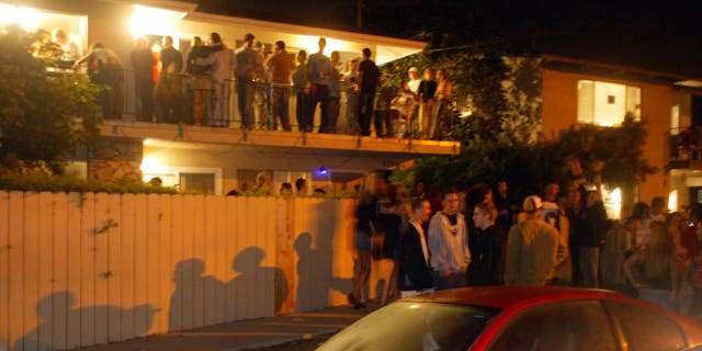 In a typical scene along Del Playa Blvd on a Friday or Saturday night in Isla Vista, party goers stand on balconies and spill out into the street. The Santa Barbara Sheriff's keeps a team of dozens of deputies busy on foot and bicycle patrols protecting the students from themselves and outsiders.