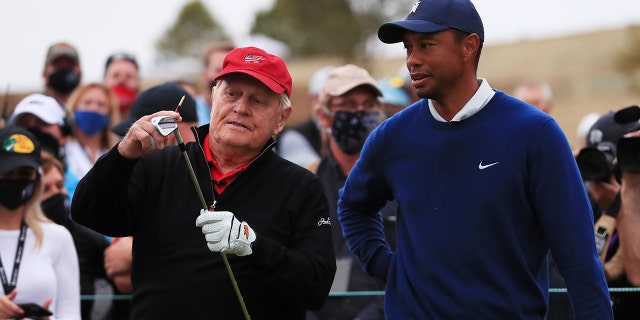 Jack Nicklaus talks to Tiger Woods of the United States on the 19th tee during the Payne’s Valley Cup on Sept. 22, 2020 on the Payne’s Valley course at Big Cedar Lodge in Ridgedale, Missouri.