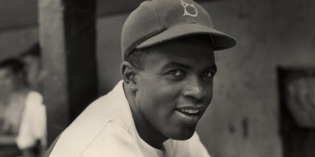 A portrait of the Brooklyn Dodgers' infielder Jackie Robinson in uniform in 1945.