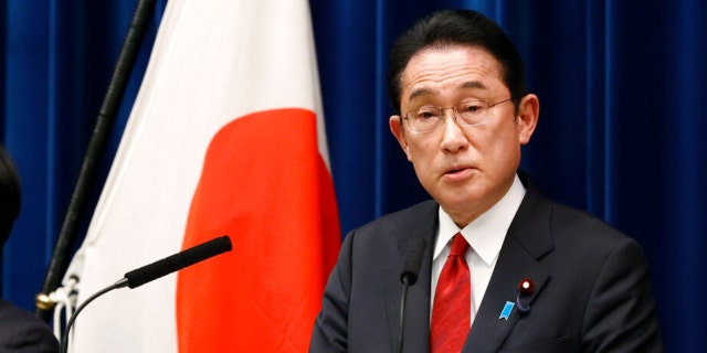 Japanese PM Fumio Kishida at lectern