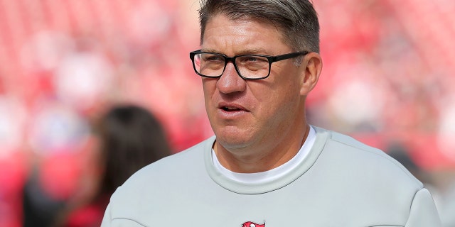 Tampa Bay Buccaneers General Manager Jason Licht walks along the sidelines before the NFC Divisional game between the Los Angeles Rams and the Tampa Bay Buccaneers on Jan. 23, 2022 at Raymond James Stadium in Tampa, Florida.